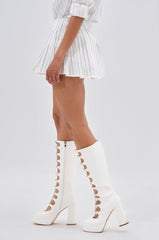 ONTO THE NEXT EMBELLISHED PLEATED MINI SKIRT IN WHITE