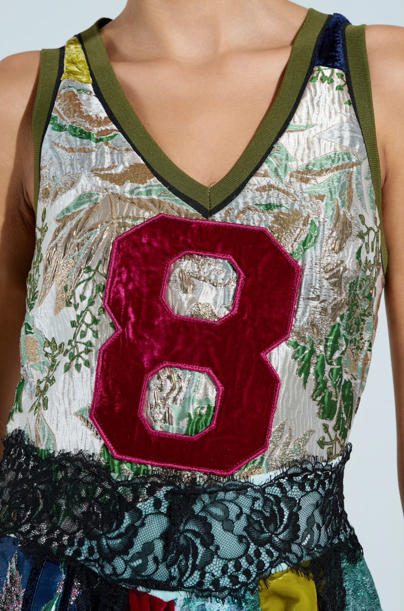 CLEAT CHASER LAYERED JERSEY HIGH LOW DRESS IN BROCADE