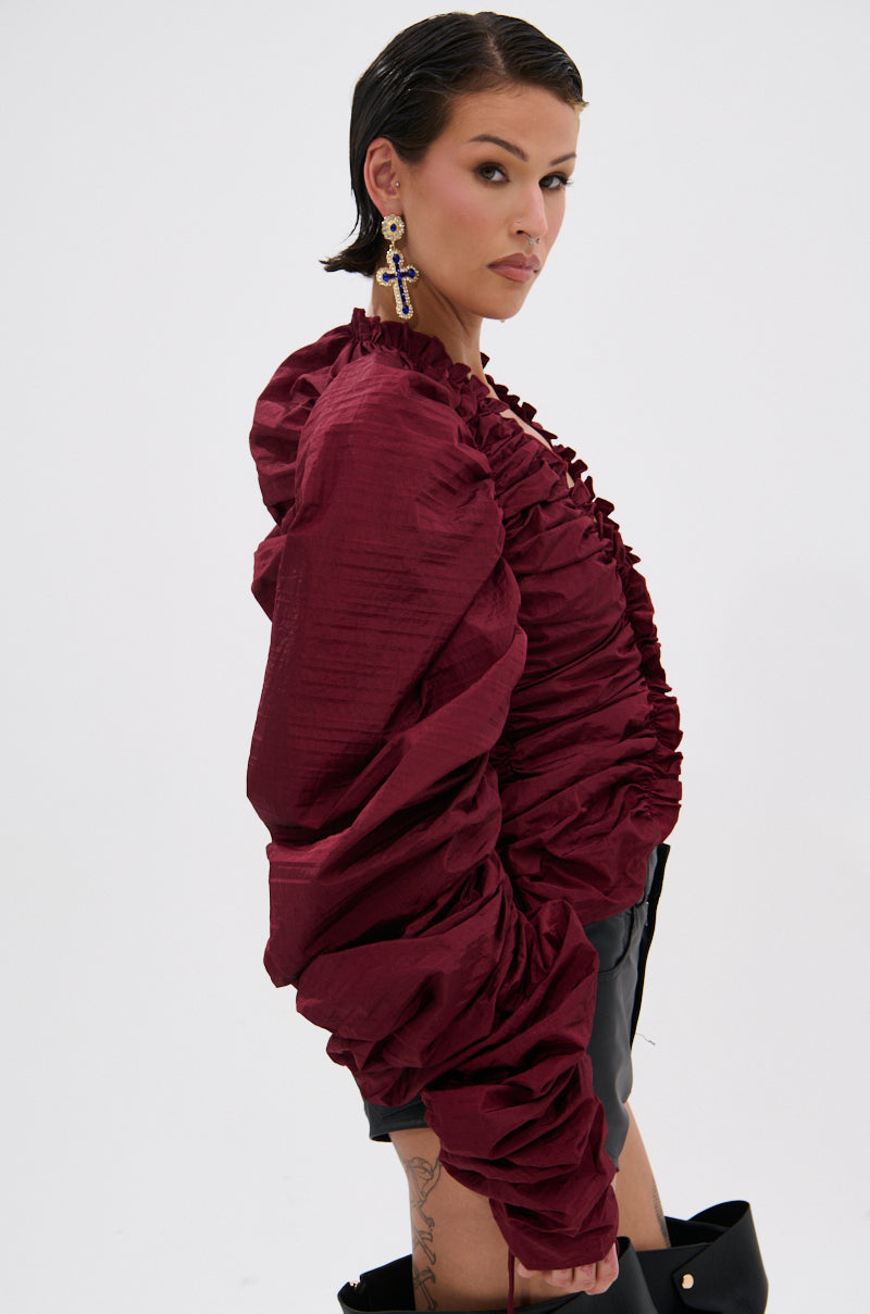 IN IT TO WIN IT RUCHED BLOUSE IN BURGUNDY