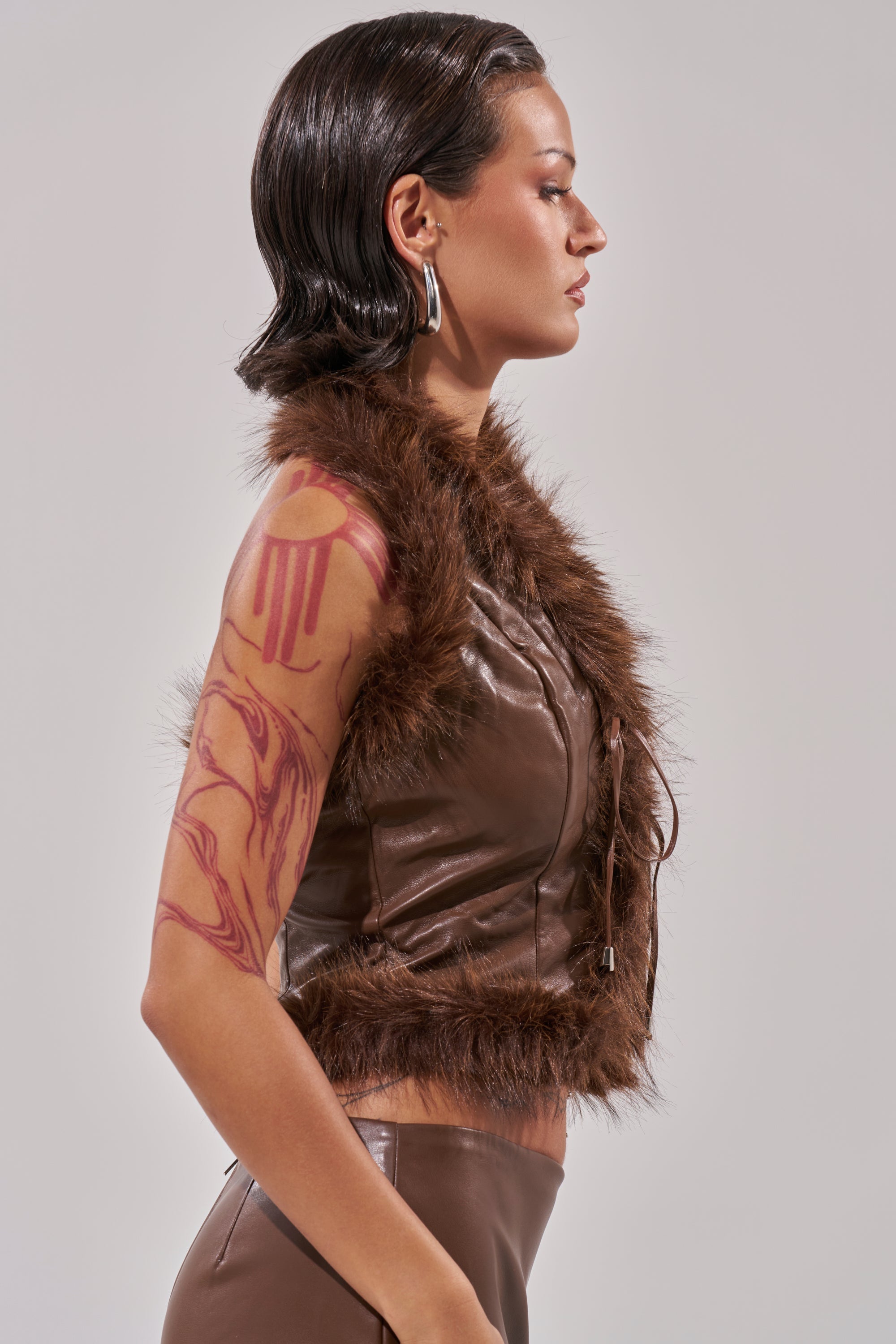 CANT MISS ME FAUX LEATHER FUR CORSET