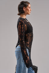 ASYMMETRICAL KNIT SWEATER