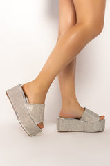 AND ANOTHER ONE SLIP ON FLATFORM SANDAL