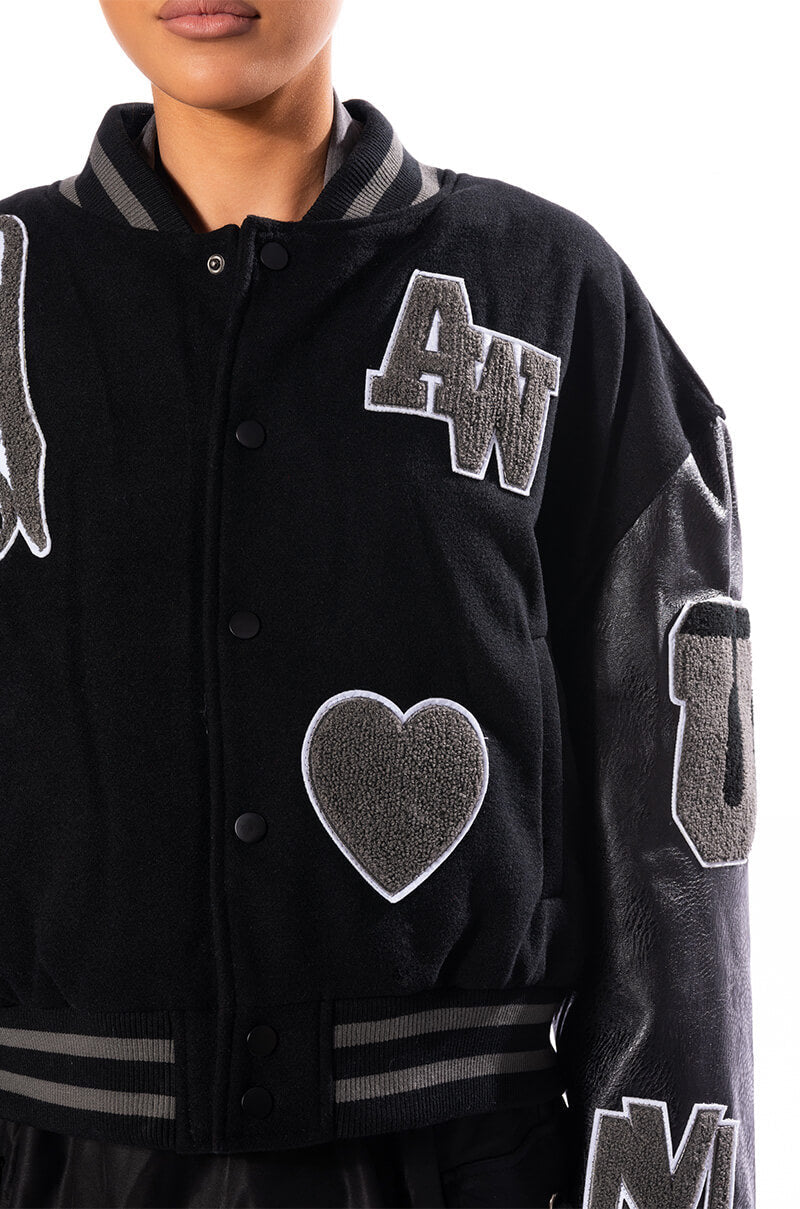 RUELA BLACK OUT OVERSIZED VARSITY BOMBER